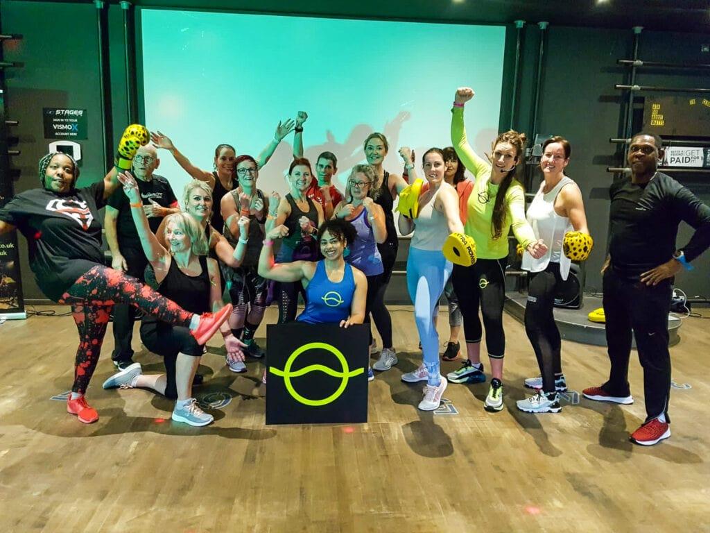 Vibe Life community fitness group smiling outdoors